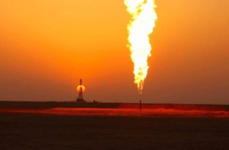 Oil Well Flaring At Sunset